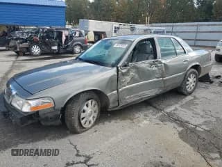 ✅ 2003 Mercury Grand Marquis LS Premium • VIN: 2MEFM75W73X699958 • Лот: 90725825. Опубликован ранее на Copart с пробегом 89 520 миль. Бесплатный доступ к архиву аукционных продаж из США и подробный отчёт об истории автомобиля на DreamBid. Изображение 1.