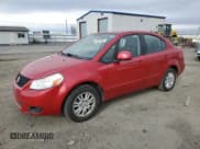 ✅ 2013 Suzuki SX4 LE • VIN: JS2YC5A34D6100482 • Lot: 50810535. Wystawiony na Copart z przebiegiem 72 231 mil. Bezpłatny archiwum sprzedaży aukcyjnych z USA i szczegółowy raport historii pojazdu na DreamBid. Zdjęcie 1.