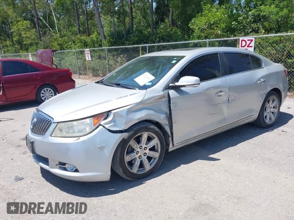 ✅ 2013 Buick LaCrosse Leather • VIN: 1G4GC5E30DF149481 • Lot: 42121632. Listed on IAAI with 166,242 mi. Free auction sales archive from the USA and detailed vehicle history report at DreamBid. Image 2.