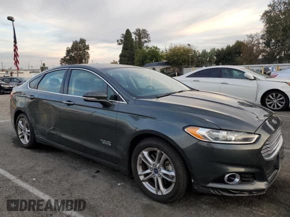 ✅ 2015 Ford Fusion Titanium • VIN: 3FA6P0SU1FR284503 • Lot: 85435815. Listed on Copart with 186,005 mi. Free auction sales archive from the USA and detailed vehicle history report at DreamBid. Image 4.