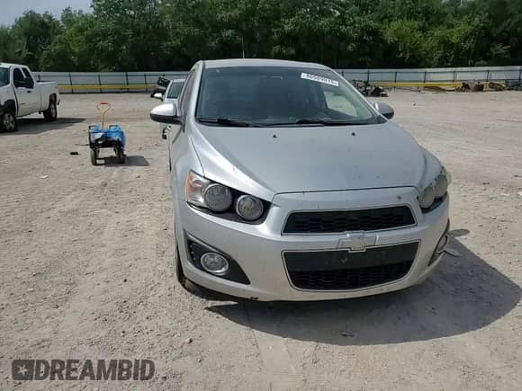 2012 Chevrolet Sonic LTZ с VIN 1G1JE5SH8C4108328, выставлен на аукционе Copart как лот 80509915 с пробегом 111 625 миль миль и Списание • Salvage title. История ставок и продаж доступна на DreamBid. Изображение 13.