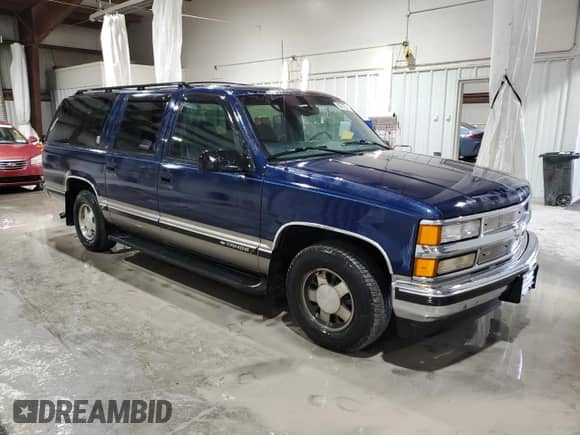 1998 Chevrolet Suburban с VIN 1GNEC16R5WJ361307, выставлен на аукционе Copart как лот 85717335 с пробегом 29 147 миль миль и Списание • Salvage title. История ставок и продаж доступна на DreamBid. Изображение 4.