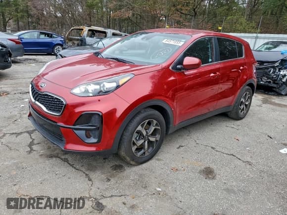 ✅ 2021 Kia Sportage LX • VIN: KNDPM3AC6M7928194 • Лот: 94571855. Опубликован ранее на Copart с пробегом 70 706 миль. Бесплатный доступ к архиву аукционных продаж из США и подробный отчёт об истории автомобиля на DreamBid. Изображение 1.