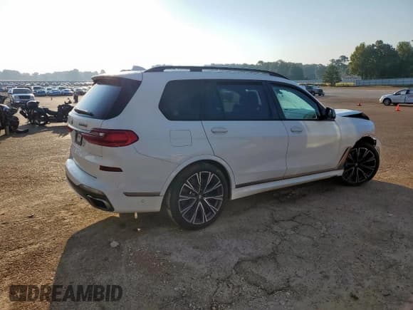 ✅ 2020 BMW X7 M50i • VIN: 5UXCX6C05L9C38130 • Lot: 71829275. Listed on Copart with 86,202 mi. Free auction sales archive from the USA and detailed vehicle history report at DreamBid. Image 3.