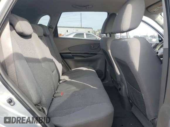 2009 Hyundai Tucson GLS with VIN KM8JM12B79U012399, listed as a Copart auction lot 77663414 with 164,615 mi miles and Salvage title. Bid and sale history available at DreamBid. Image 11.