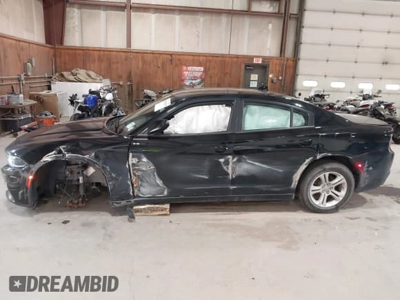 ✅ 2023 Dodge Charger SXT • VIN: 2C3CDXBG8PH529792 • Lot: 43158299. Listed on IAAI with 46,499 mi. Free auction sales archive from the USA and detailed vehicle history report at DreamBid. Image 6.