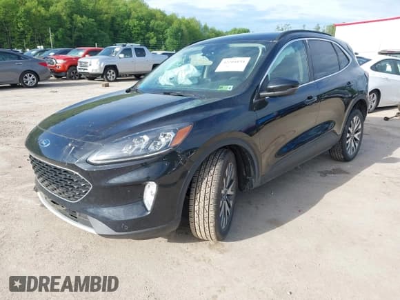 ✅ 2020 Ford Escape Titanium • VIN: 1FMCU9J96LUA72557 • Lot: 42204154. Listed on IAAI with 100 mi. Free auction sales archive from the USA and detailed vehicle history report at DreamBid. Image 2.