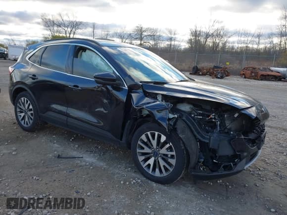 ✅ 2020 Ford Escape Titanium • VIN: 1FMCU9J9XLUB30993 • Lot: 43653347. Listed on IAAI with 88,349 mi. Free auction sales archive from the USA and detailed vehicle history report at DreamBid. Image 1.