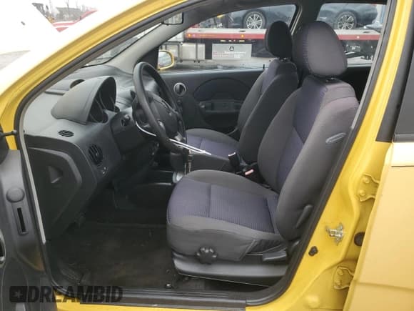 ✅ 2007 Chevrolet Aveo LS • VIN: KL1TD666X7B778585 • Lot: 49772235. Wystawiony na Copart z przebiegiem 40 345 mil. Bezpłatny archiwum sprzedaży aukcyjnych z USA i szczegółowy raport historii pojazdu na DreamBid. Zdjęcie 7.