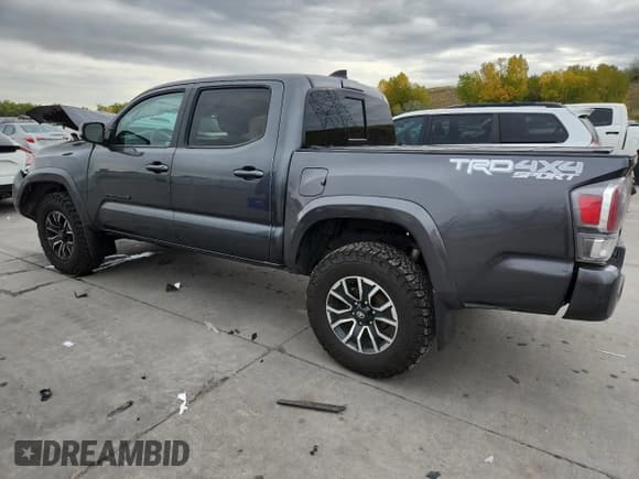 ✅ 2023 Toyota Tacoma TRD Sport • VIN: 3TMCZ5AN1PM557548 • Лот: 82419795. Опубликован ранее на Copart с пробегом 58 725 миль. Бесплатный доступ к архиву аукционных продаж из США и подробный отчёт об истории автомобиля на DreamBid. Изображение 2.