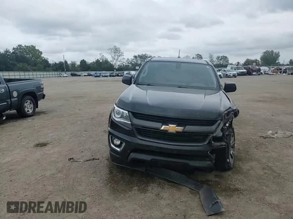 ✅ 2017 Chevrolet Colorado 4WD Z71 • VIN: 1GCHTDEN4H1301480 • Lot: 82056055. Listed on Copart with 125,891 mi. Free auction sales archive from the USA and detailed vehicle history report at DreamBid. Image 13.