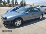 ✅ 1999 Ford Taurus SE Comfort • VIN: 1FAFP53S5XG326903 • Lot: 52529925. Listed on Copart with 104,198 mi. Free auction sales archive from the USA and detailed vehicle history report at DreamBid. Image 1.