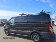 ✅ 2015 Ford Transit Cargo • VIN: 1FTYE1YM2FKA21561 • Лот: 86949274. Опубликован ранее на Copart с пробегом 160 535 миль. Бесплатный доступ к архиву аукционных продаж из США и подробный отчёт об истории автомобиля на DreamBid. Изображение 2.