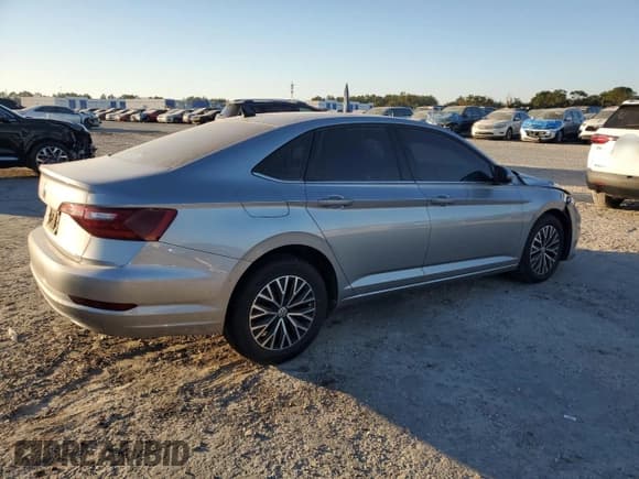 ✅ 2021 Volkswagen Jetta S • VIN: 3VWC57BU4MM100139 • Лот: 92348545. Опубликован ранее на Copart с пробегом 66 088 миль. Бесплатный доступ к архиву аукционных продаж из США и подробный отчёт об истории автомобиля на DreamBid. Изображение 3.