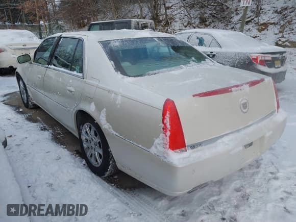✅ 2009 Cadillac DTS 1SA • VIN: 1G6KD57Y69U125633 • Лот: 41332008. Опубликован ранее на IAAI с пробегом 171 086 миль. Бесплатный доступ к архиву аукционных продаж из США и подробный отчёт об истории автомобиля на DreamBid. Изображение 3.