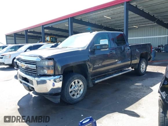 ✅ 2015 Chevrolet Silverado 2500HD LT • VIN: 1GC1KVE8XFF117049 • Lot: 42800240. Listed on IAAI with 375,598 mi. Free auction sales archive from the USA and detailed vehicle history report at DreamBid. Image 2.