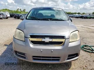 ✅ 2007 Chevrolet Aveo LS • VIN: KL1TD56677B078579 • Lot: 62589705. Wystawiony na Copart z przebiegiem 143 141 mil. Bezpłatny archiwum sprzedaży aukcyjnych z USA i szczegółowy raport historii pojazdu na DreamBid. Zdjęcie 5.