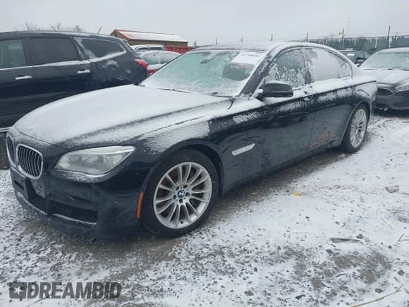 ✅ 2014 BMW 7 Series 750i xDrive • VIN: WBAYB6C56ED225091 • Lot: 41718516. Listed on IAAI with 63,616 mi. Free auction sales archive from the USA and detailed vehicle history report at DreamBid. Image 2.