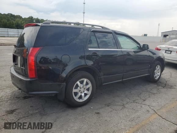 ✅ 2006 Cadillac SRX • VIN: 1GYEE637360195713 • Лот: 80626945. Опубликован ранее на Copart с пробегом Не указан. Бесплатный доступ к архиву аукционных продаж из США и подробный отчёт об истории автомобиля на DreamBid. Изображение 3.