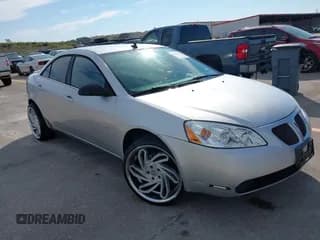 ✅ 2009 Pontiac G6 1SA • VIN: 1G2ZG57B394200159 • Lot: 43390383. Listed on IAAI with 172,808 mi. Free auction sales archive from the USA and detailed vehicle history report at DreamBid. Image 1.