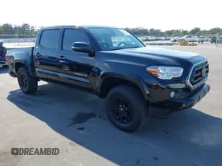 ✅ 2022 Toyota Tacoma SR5 • VIN: 3TMAZ5CN0NM165792 • Lot: 43752582. Listed on IAAI with 45,025 mi. Free auction sales archive from the USA and detailed vehicle history report at DreamBid. Image 1.