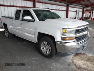 ✅ 2018 Chevrolet Silverado 1500 LT • VIN: 1GCRCREH2JZ296119 • Лот: 43270438. Опубликован ранее на IAAI с пробегом 192 082 миль. Бесплатный доступ к архиву аукционных продаж из США и подробный отчёт об истории автомобиля на DreamBid. Изображение 1.