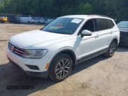 ✅ 2021 Volkswagen Tiguan S • VIN: 3VV0B7AXXMM019724 • Lot: 43010285. Listed on IAAI with 84,840 mi. Free auction sales archive from the USA and detailed vehicle history report at DreamBid. Image 2.