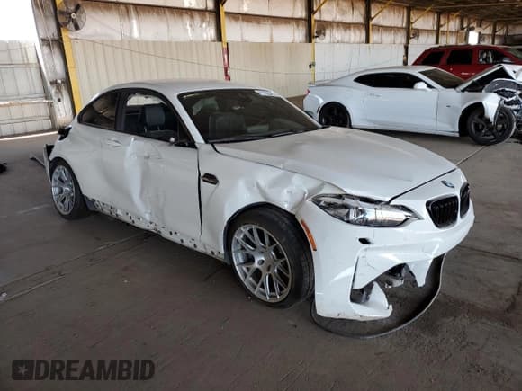 ✅ 2018 BMW M2 • VIN: WBS1J5C57JVA12877 • Lot: 71182045. Listed on Copart with 70,621 mi. Free auction sales archive from the USA and detailed vehicle history report at DreamBid. Image 4.