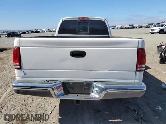 ✅ 2000 Dodge Dakota Sport • VIN: 1B7GL22N5YS544651 • Lot: 84993785. Wystawiony na Copart z przebiegiem 137 008 mil. Bezpłatny archiwum sprzedaży aukcyjnych z USA i szczegółowy raport historii pojazdu na DreamBid. Zdjęcie 6.