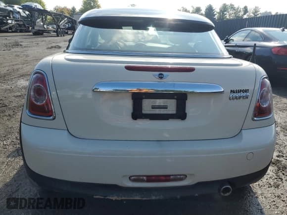 ✅ 2012 MINI Coupe • VIN: WMWSX1C52CT164027 • Lot: 74329124. Listed on Copart with Not provided. Free auction sales archive from the USA and detailed vehicle history report at DreamBid. Image 6.