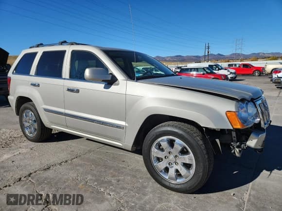 ✅ 2009 Jeep Grand Cherokee • VIN: 1J8HR68T69C520847 • Lot: 89548155. Listed on Copart with 322,340 mi. Free auction sales archive from the USA and detailed vehicle history report at DreamBid. Image 4.