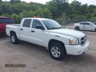 ✅ 2006 Dodge Dakota SLT • VIN: 1D7HW48K66S654342 • Lot: 42974502. Wystawiony na IAAI z przebiegiem 89 923 mil. Bezpłatny archiwum sprzedaży aukcyjnych z USA i szczegółowy raport historii pojazdu na DreamBid. Zdjęcie 1.