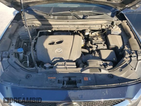 ✅ 2021 Mazda CX-5 Grand Touring • VIN: JM3KFBDM2M0436250 • Лот: 93709985. Опубликован ранее на Copart с пробегом Не указан. Бесплатный доступ к архиву аукционных продаж из США и подробный отчёт об истории автомобиля на DreamBid. Изображение 12.