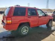 ✅ 1998 Jeep Grand Cherokee Laredo • VIN: 1J4GZ48Y8WC277924 • Lot: 51314935. Listed on Copart with 183,782 mi. Free auction sales archive from the USA and detailed vehicle history report at DreamBid. Image 3.