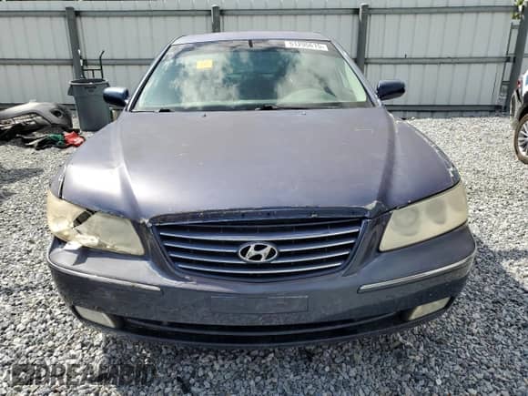 2006 Hyundai Azera SE с VIN KMHFC46F36A129241, выставлен на аукционе Copart как лот 51295615 с пробегом Не указан миль и Списание • Salvage title. История ставок и продаж доступна на DreamBid. Изображение 5.