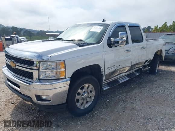 2013 Chevrolet Silverado 2500HD LTZ with VIN 1GC1KYCG7DF151006, listed as a IAAI auction lot 43263484 with 129,989 mi miles and . Bid and sale history available at DreamBid. Image 2.