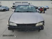 ✅ 1999 Toyota Corolla LE • VIN: 1NXBR12E6XZ148570 • Лот: 81554415. Опубликован ранее на Copart с пробегом 264 960 миль. Бесплатный доступ к архиву аукционных продаж из США и подробный отчёт об истории автомобиля на DreamBid. Изображение 5.