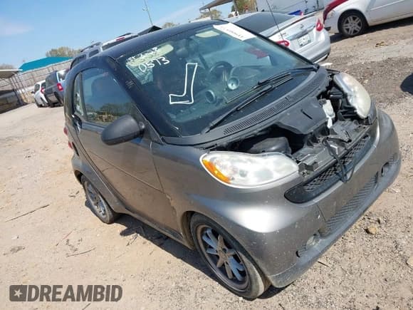 ✅ 2009 Smart fortwo Pure • VIN: WMEEJ31X99K302227 • Lot: 41900573. Listed on IAAI with 30,730 mi. Free auction sales archive from the USA and detailed vehicle history report at DreamBid. Image 1.