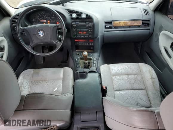 1998 BMW 3 Series z VIN WBACD3328WAV23184, wystawiony jako Copart lot #58570555 z przebiegiem 181 087 mil mil oraz Szkoda całkowita • Salvage title. Historia ofert i sprzedaży dostępna na DreamBid. Obrazek 8.