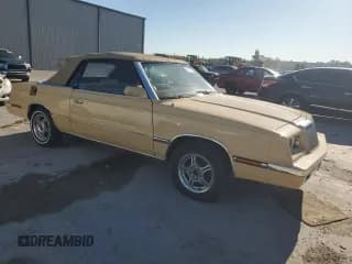✅ 1985 Chrysler LeBaron • VIN: 1C3BC55D2FG280873 • Lot: 48487345. Wystawiony na Copart z przebiegiem 15 153 mil. Bezpłatny archiwum sprzedaży aukcyjnych z USA i szczegółowy raport historii pojazdu na DreamBid. Zdjęcie 4.
