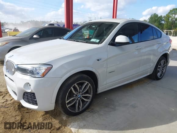 ✅ 2016 BMW X4 xDrive28i • VIN: 5UXXW3C58G0R18691 • Lot: 43922366. Listed on IAAI with 102,409 mi. Free auction sales archive from the USA and detailed vehicle history report at DreamBid. Image 17.