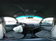 ✅ 2014 Toyota Tacoma PreRunner • VIN: 3TMJU4GN5EM159313 • Lot: 43633698. Listed on IAAI with 124,549 mi. Free auction sales archive from the USA and detailed vehicle history report at DreamBid. Image 18.