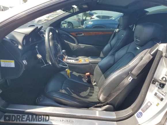 ✅ 2009 Mercedes-Benz SL 55/63 AMG • VIN: WDBSK70F99F155851 • Lot: 67481785. Wystawiony na Copart z przebiegiem 58 715 mil. Bezpłatny archiwum sprzedaży aukcyjnych z USA i szczegółowy raport historii pojazdu na DreamBid. Zdjęcie 7.