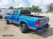 ✅ 2000 Dodge Dakota • VIN: 1B7GG2AX7YS735141 • Lot: 43214718. Listed on IAAI with 220,792 mi. Free auction sales archive from the USA and detailed vehicle history report at DreamBid. Image 3.