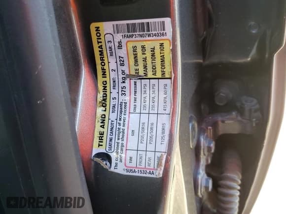 ✅ 2007 Ford Focus S • VIN: 1FAHP37N07W340361 • Lot: 91996555. Listed on Copart with Not provided. Free auction sales archive from the USA and detailed vehicle history report at DreamBid. Image 12.