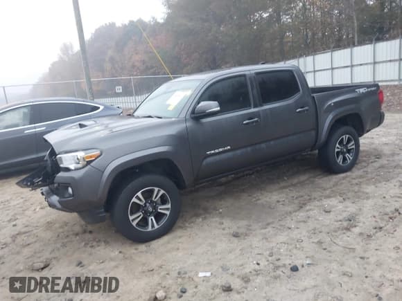 ✅ 2019 Toyota Tacoma SR5 • VIN: 3TMAZ5CN9KM099786 • Lot: 43628031. Listed on IAAI with 98,782 mi. Free auction sales archive from the USA and detailed vehicle history report at DreamBid. Image 2.