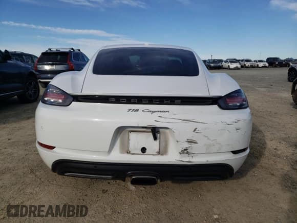 ✅ 2017 Porsche 718 Cayman • VIN: WP0AA2A81HS270209 • Lot: 87940065. Wystawiony na Copart z przebiegiem 127 160 mil. Bezpłatny archiwum sprzedaży aukcyjnych z USA i szczegółowy raport historii pojazdu na DreamBid. Zdjęcie 10.