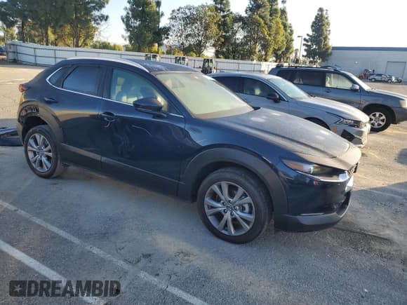 ✅ 2023 Mazda CX-30 S Preferred • VIN: 3MVDMBCM1PM571406 • Lot: 93338865. Listed on Copart with 32,664 mi. Free auction sales archive from the USA and detailed vehicle history report at DreamBid. Image 4.