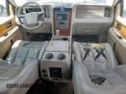 ✅ 2014 Lincoln Navigator • VIN: 5LMJJ3H59EEL04661 • Lot: 68027895. Listed on Copart with 177,186 mi. Free auction sales archive from the USA and detailed vehicle history report at DreamBid. Image 8.