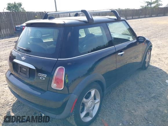 ✅ 2005 MINI Hardtop • VIN: WMWRC335X5TJ72336 • Lot: 42584154. Listed on IAAI with 168,135 mi. Free auction sales archive from the USA and detailed vehicle history report at DreamBid. Image 4.